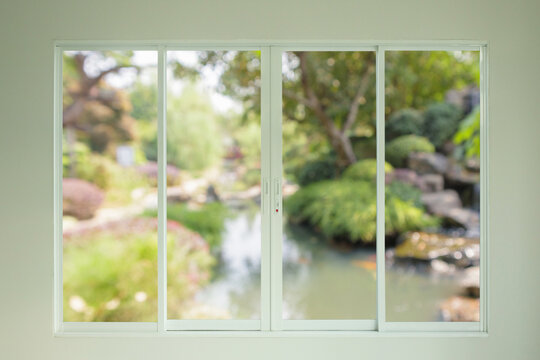 Fototapeta garden view outside through the window