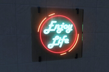 Illuminated enjoy life neon text on black wall