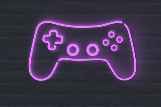 Illuminated remote control on black wall