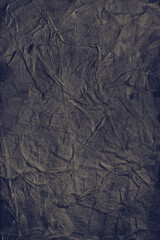 Textured handmade dark textile background with mesh and paper base. Vertical background handmade for design