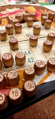 lotto game. wooden barrels and cards with numbers