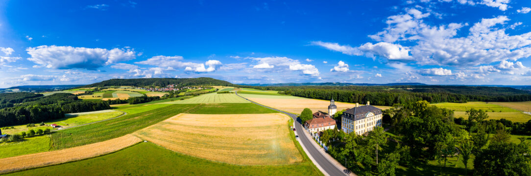 Germany, Bavaria, Eggolsheim, Aerial view of Jagersburg Castle in rural landscape