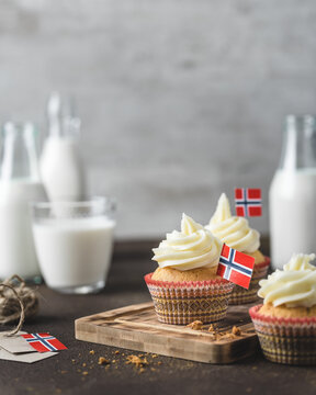A photo of muffins with Norwegian flag to Norwegian Independence day or for birthday