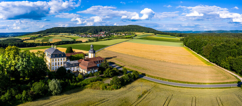 Germany, Bavaria, Eggolsheim, Aerial view of Jagersburg Castle in rural landscape