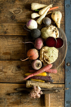 Winter vegetables on rustic wooden background