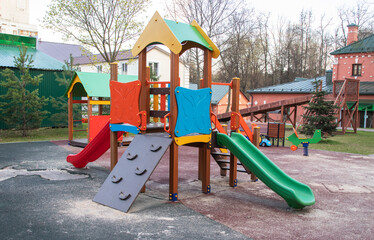 children's playground with slides and rocking chairs