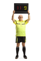 Football referee showing a substitution board