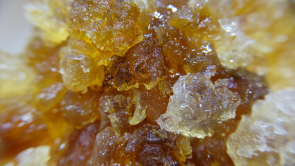 Close up of 'tao jiao', also called peach gum or peach jelly, is the resin from peach and Chinese wild peach trees. It is edible and is used for both medicinal and culinary purposes.