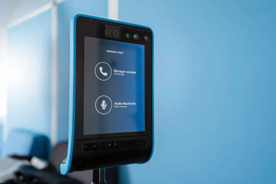 Close-up of assistant robot screen at office