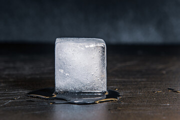 ice cube on black background. water. 