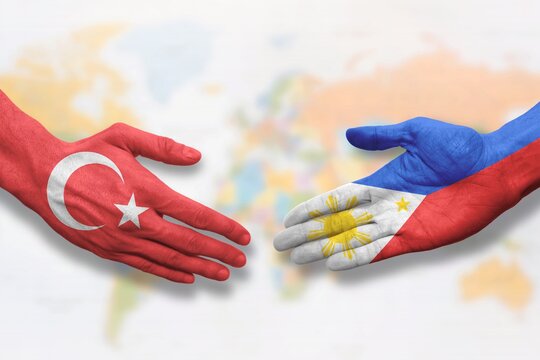 Turkey and the Philippines - Flag handshake symbolizing partnership and cooperation