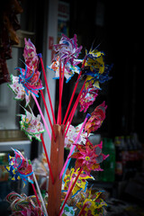 Closeup shot of colorful propeller toys on sticks