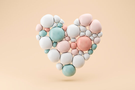Three dimensional render of floating heart made of pastel colored spheres