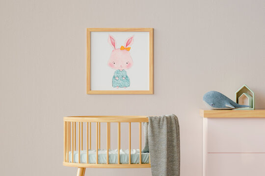 Three dimensional render of picture hanging on wall over empty crib