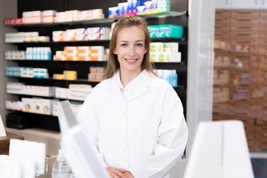 Female Pharmacist At Checkout