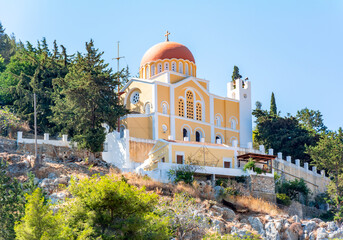 Obraz premium Traditional church over Symi town, Greece