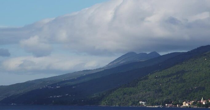 Timelapse of the clouds below the Ucka mountain and the Adriatic Sea Croatia