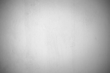 The concept using a program to blur the image of a white concrete wall. White grunge cement or painted concrete wall surface. Abstract slightly blurred cement wall background.
