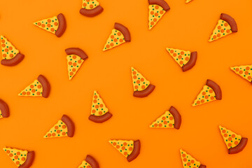 Three dimensional render of pizza slices on orange background