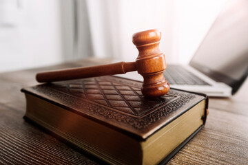 justice and law concept.Male judge in a courtroom on wooden table and Counselor or Male lawyer...