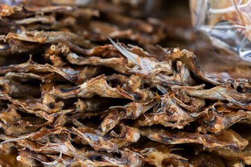 Dried Fish one of the dried seafood dishes, lined up on a tray and blurred the background.