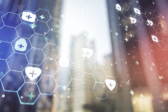 Double exposure of abstract virtual medical hologram on modern skyscrapers background. Healthcare technolody concept