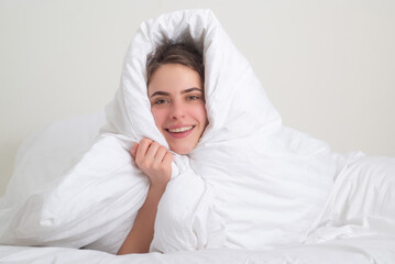 Woman lie in bed woke up after sleeping in morning, enjoy new day, enough sleep concept.