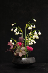 Ikebana flower arangement with spring blooms