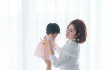 Mother and daughter newborn in home,Happy time of family,Single mom concept,Concept mother day