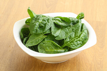 Fresh green spinach leaves in the bowl