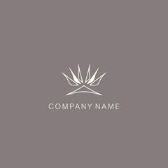 Obraz premium Simple, minimalistic, stylized lotus flower symbol or logo, composed of several elements. Made with a curved contour line and spot.