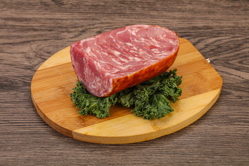 Beef ham piece over board