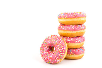 Fresh made Donuts isolated on white background. Doughnuts are traditional sweet pastries. Copy space for text.