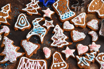 Christmas homemade gingerbread cookies. Clazed decorating gingerbread homemade cookies for christmas. Top view of cookies on table, Happy new year, celebration, overhead, top view