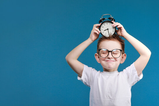 Time management. Morning. little boy with alarm clock. Happy childhood. happy child with retro clock. Define your own rhythm of life. Happy hours concept. Schedule and timing