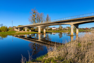 Fototapeta na wymiar Road bridge over Narew river in Strekowa Gora village in Podlaskie voivodship, near Wizna in Poland