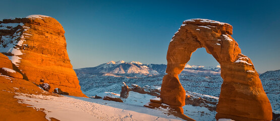 Winter sunset on Delicate arch in Arches National Park, Utah