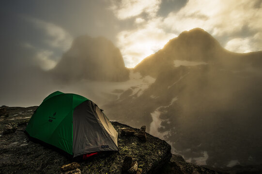 Tent below Snow Patch and Bugaboo Spires in Bugaboo Providential Park, British Columbia, Canada