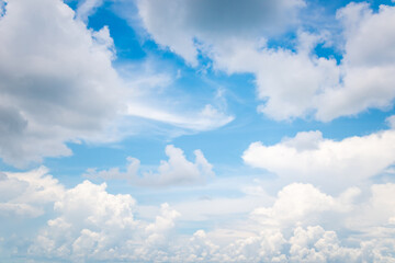 Beautiful white fluffy cloud on blue sky background.