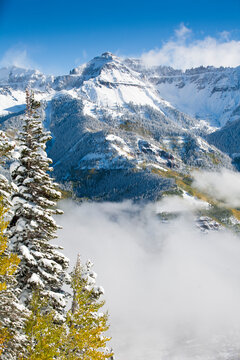 A late fall storm left a foot of fresh powder on Mt. Emma in The San Juan Mountains around Telluride, Colorado. Storms are a normal occurrence in the southern San Juan Mountains and it can snow anytime of the year. Telluride is known for great skiing terrain.