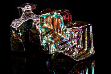 Macro mineral stone Bismuth on black background