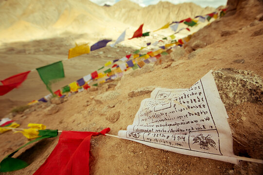 Tibetan prayer flags hanging on the mountains surrounding Leh in Ladakh, Jammu & Kashmir, India