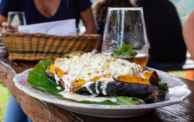 Colombian typical dish, with plantain, cheese and guava