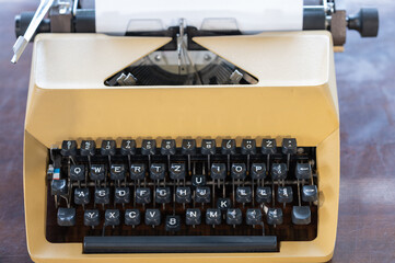 typewriter from a dozen years ago in yellow