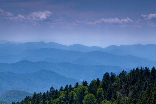 blue ridge mountains with mixed tree forest and clouds, blue ridge parkway, north Carolina