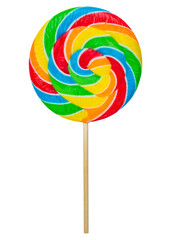 Colorful rainbow lollipop twisted on wooden stick isolated on white background. Caramel is spiral twisted into a large circle or round shape candy. Bright colors sugar sweet dessert. Close-up macro.