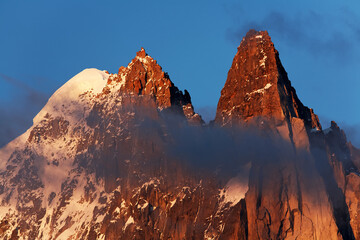 Scenic sunset view of Aiguille Verte et Les Drus, Haute Savoie, France