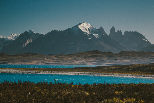The Three Towers of Paine seen from lake Sarmiento, Torres del Paine National Park a UNESCO Biosphere Reserve in Patagonia, Chile.