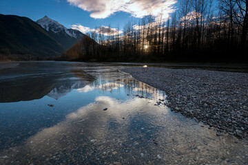 Mt. Cheam reflected into the Fraser River, Fraser Valley, Canada.