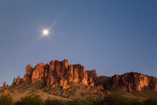 The moon rising above the western Superstition Mountains, Lost Dutchman State Park, Arizona